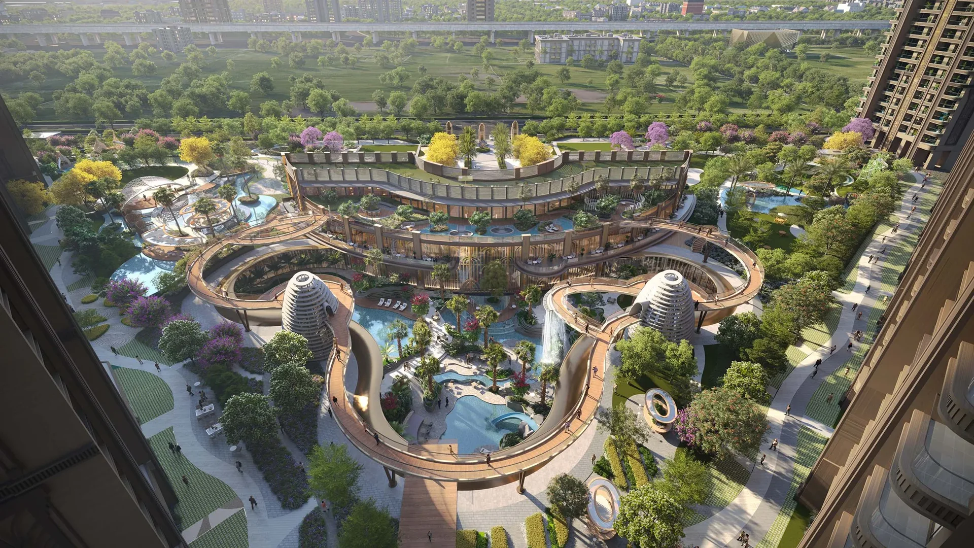Aerial visualisation of the multi-dome clubhouse, pools and landscaped grounds